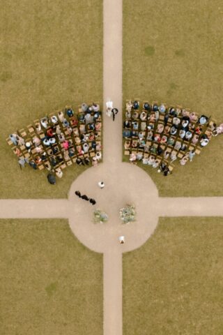 Drone photography of bride making her entrance down the aisle